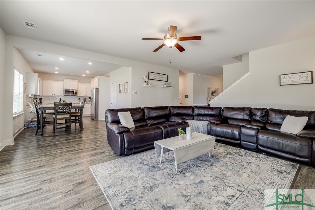 55 Saddlebrush Road Ellabell, GA 31308 - Photo 18 of 50 Great room with dining area beyond