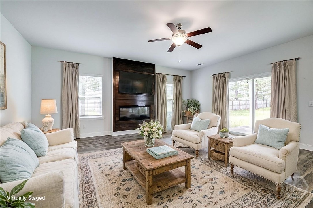 55 Saddlebrush Road Ellabell, GA 31308 - Photo 2 of 50 VIRTUALLY STAGED - Great room with electric firepl