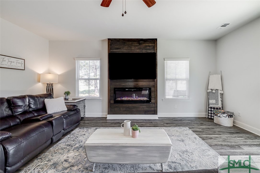 55 Saddlebrush Road Ellabell, GA 31308 - Photo 19 of 50 Great room with electric fireplace