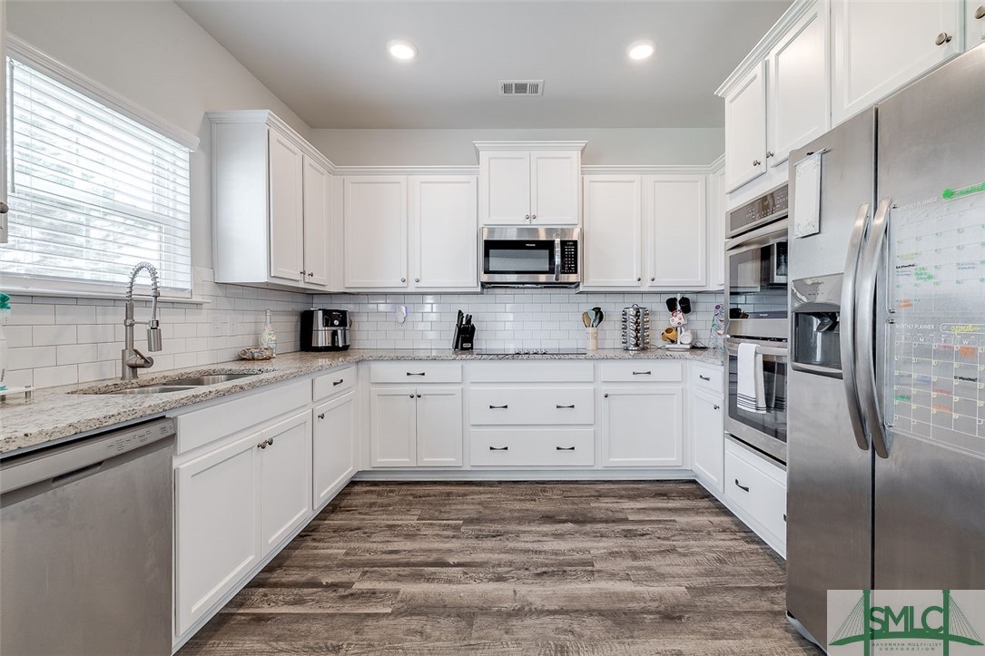 55 Saddlebrush Road Ellabell, GA 31308 - Photo 23 of 50 Kitchen with granite and stainless steel
