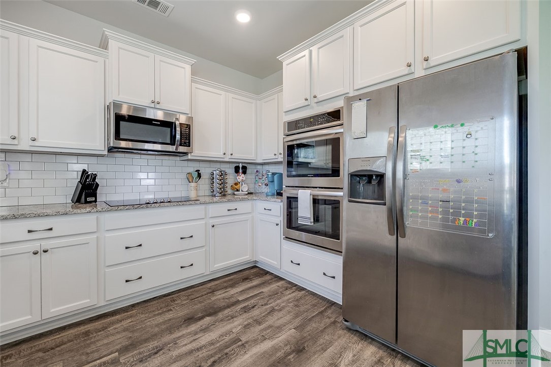 55 Saddlebrush Road Ellabell, GA 31308 - Photo 25 of 50 Double wall ovens and side by side refrigerator