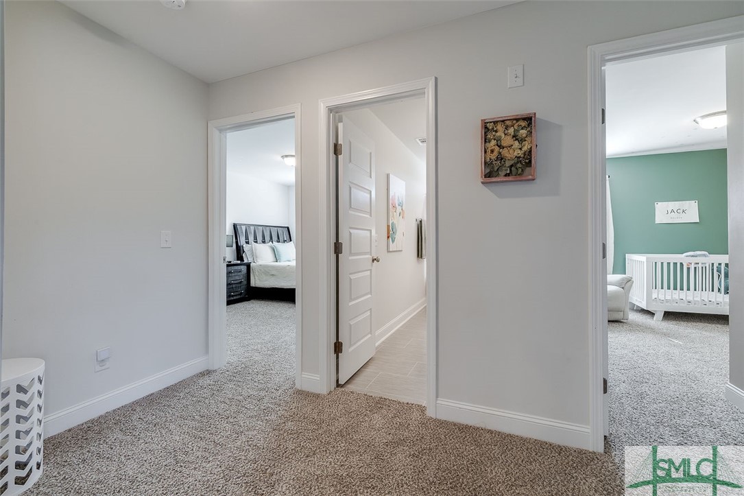 55 Saddlebrush Road Ellabell, GA 31308 - Photo 30 of 50 Top of stairs landing with doors to bedroom 3, ups