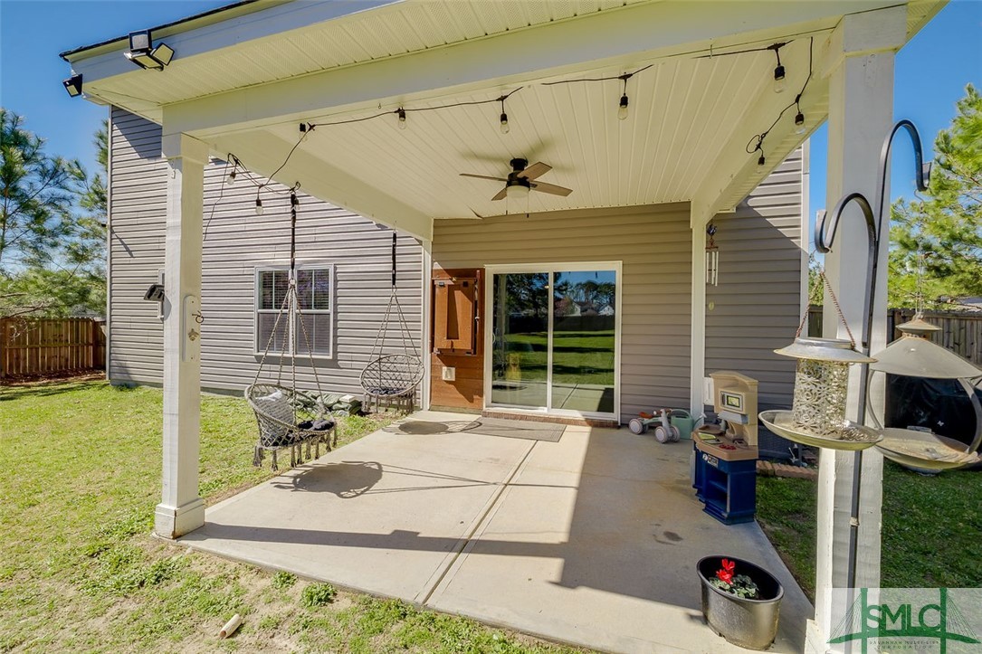 55 Saddlebrush Road Ellabell, GA 31308 - Photo 46 of 50 Covered back patio with solar garden party lightin