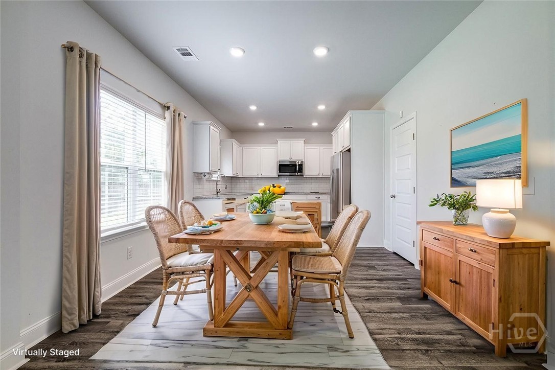 55 Saddlebrush Road Ellabell, GA 31308 - Photo 5 of 50 VIRTUALLY STAGED - Dining area with kitchen beyond