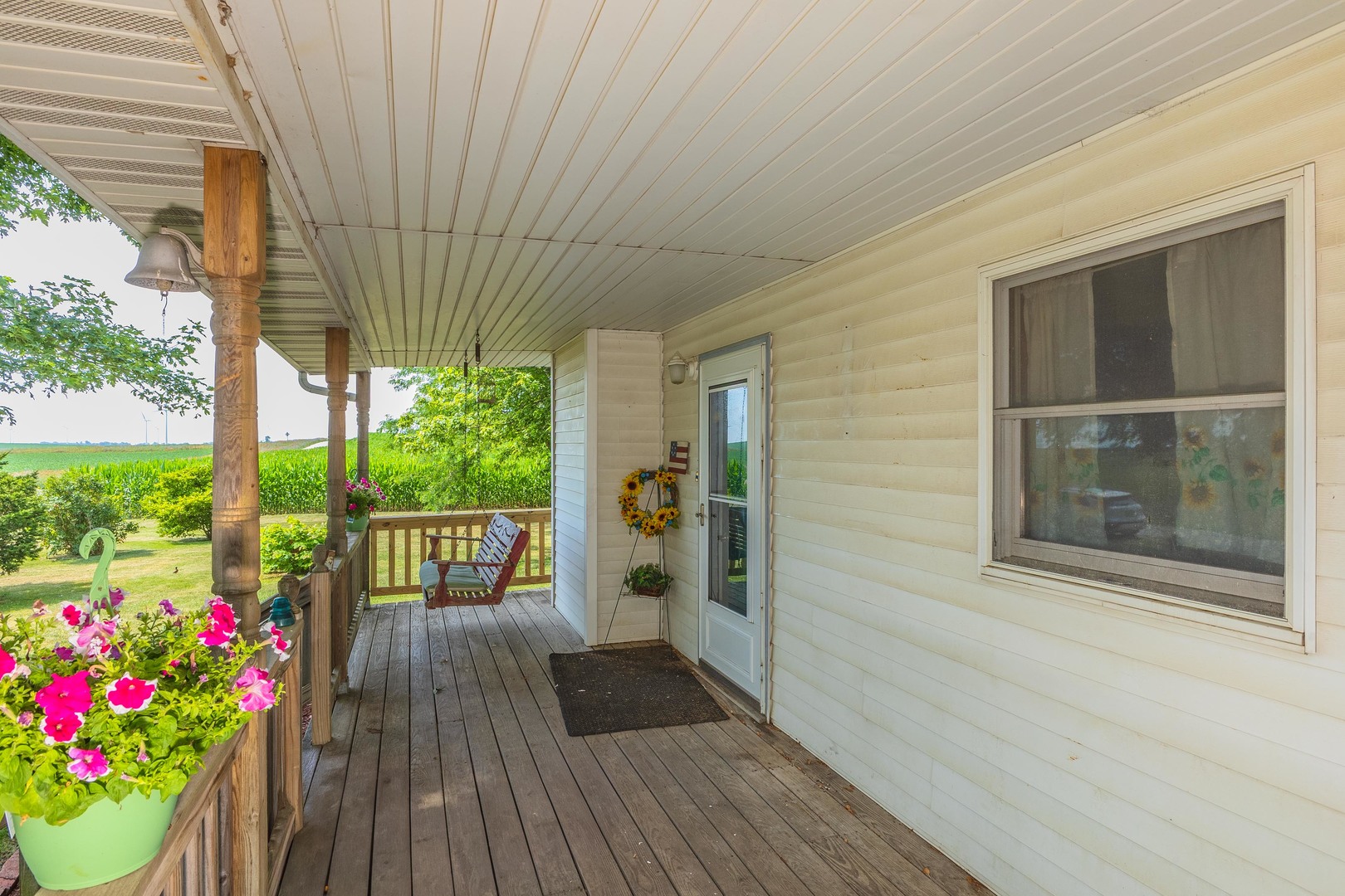 22998 East 2800 N Road Odell, IL 60460 - Photo 11 of 46 a porch with seating space and hardwood floor