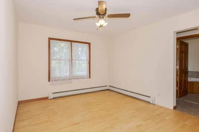 a view of an empty room with stairs