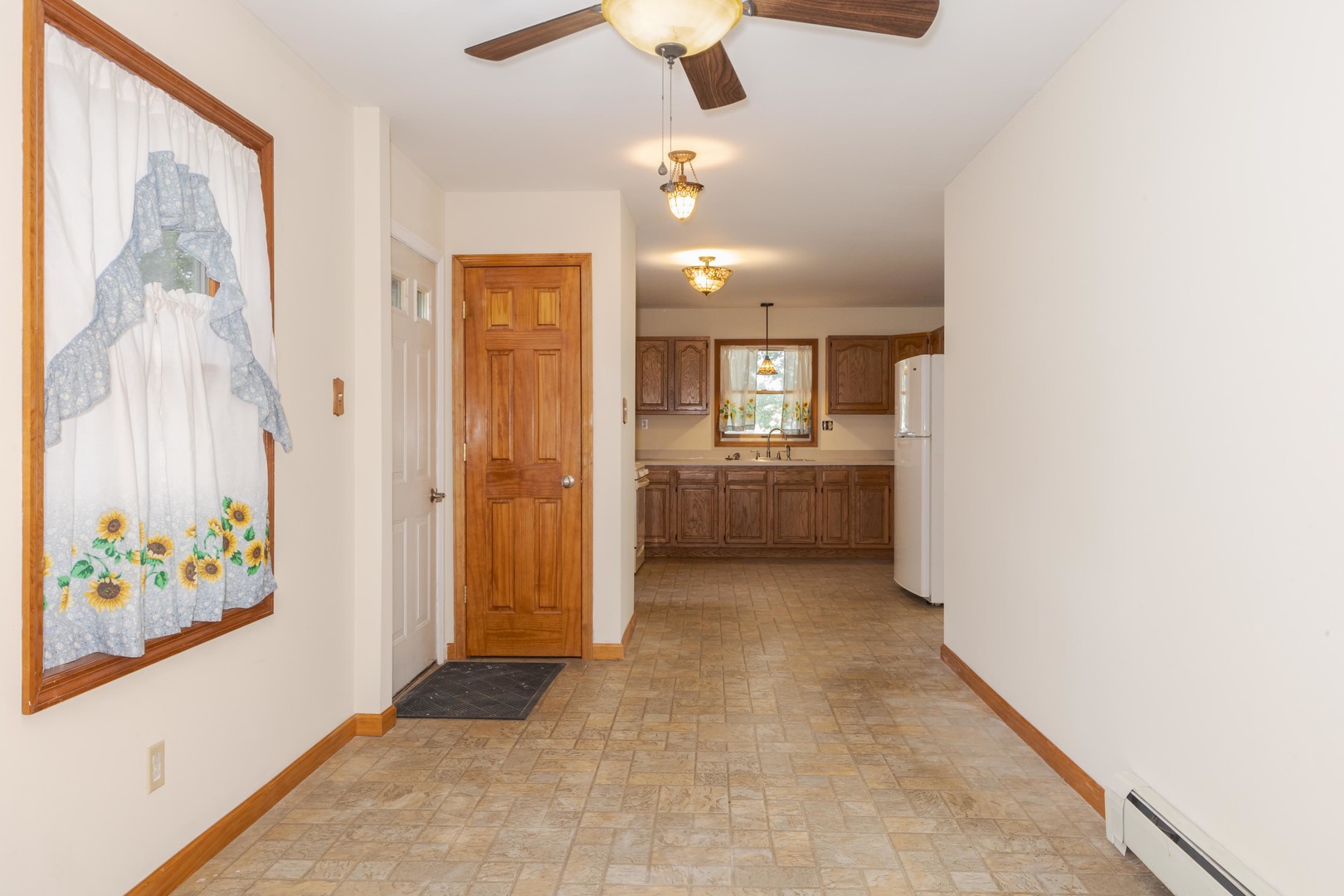 22998 East 2800 N Road Odell, IL 60460 - Photo 23 of 46 a view of a hallway to rooms and wooden floor