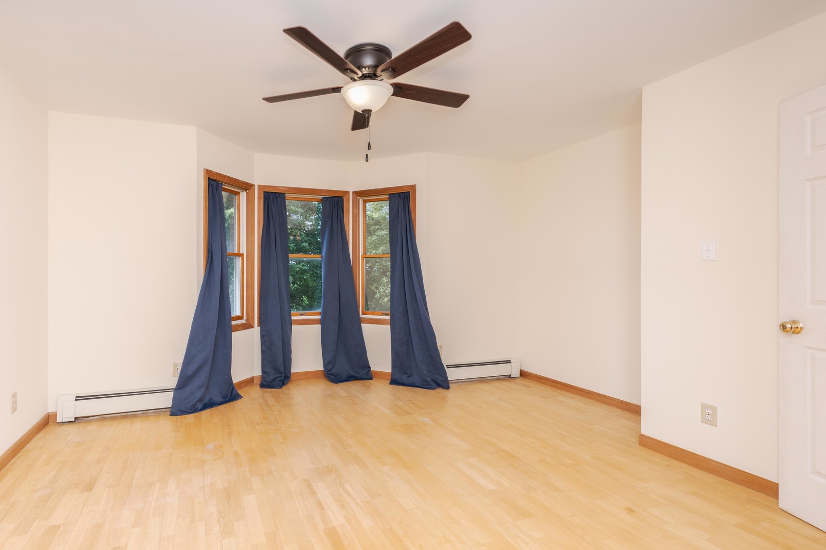 22998 East 2800 N Road Odell, IL 60460 - Photo 28 of 46 an empty room with ceiling fan and window