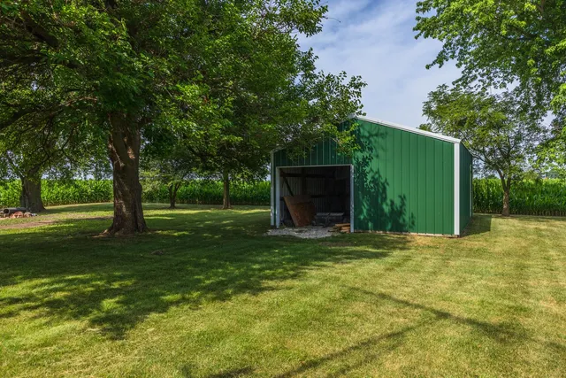 a view of a garden with a lake