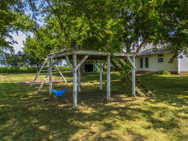 a view of a backyard with a garden