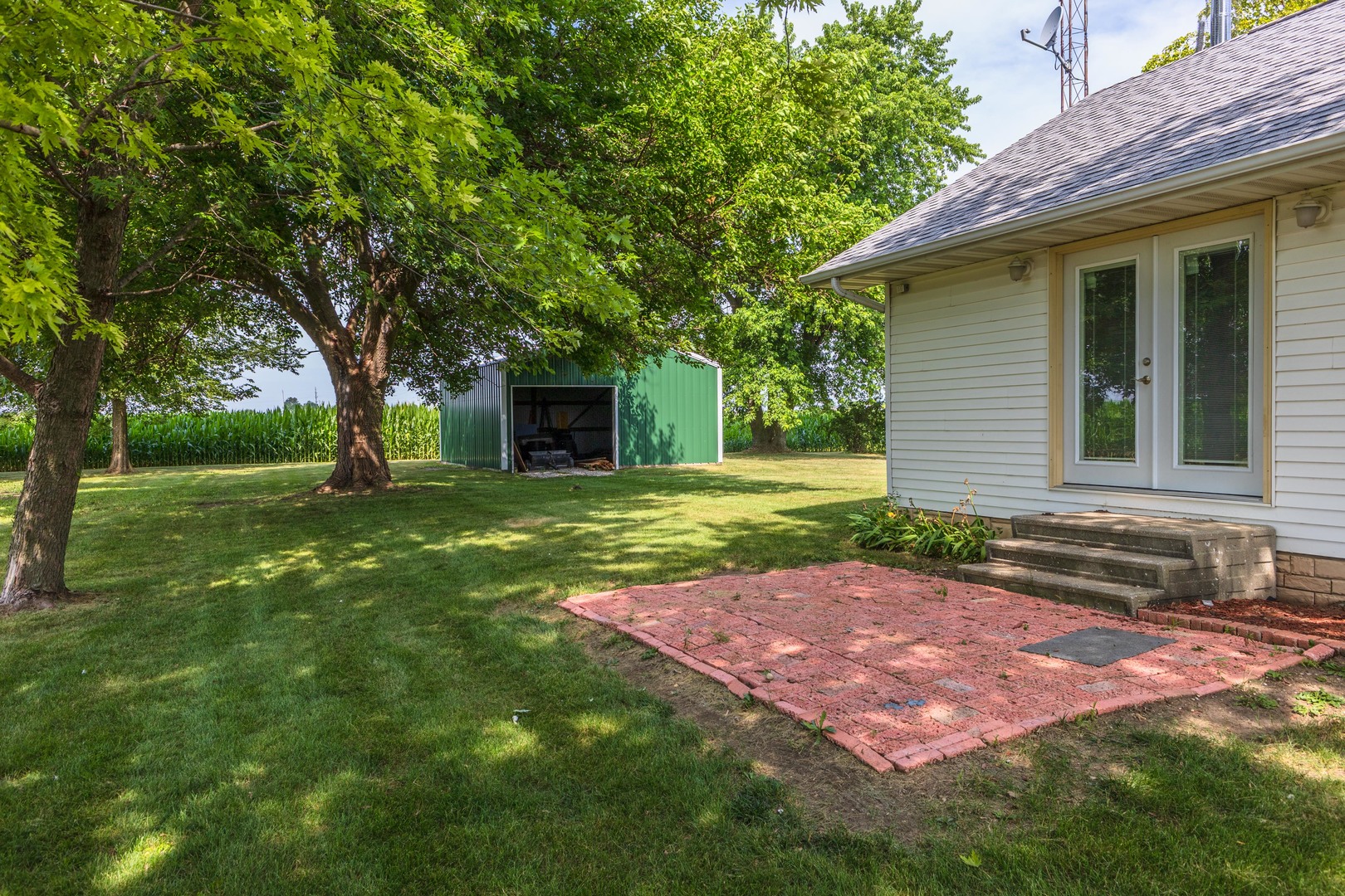 22998 East 2800 N Road Odell, IL 60460 - Photo 44 of 46 a view of a backyard with a garden
