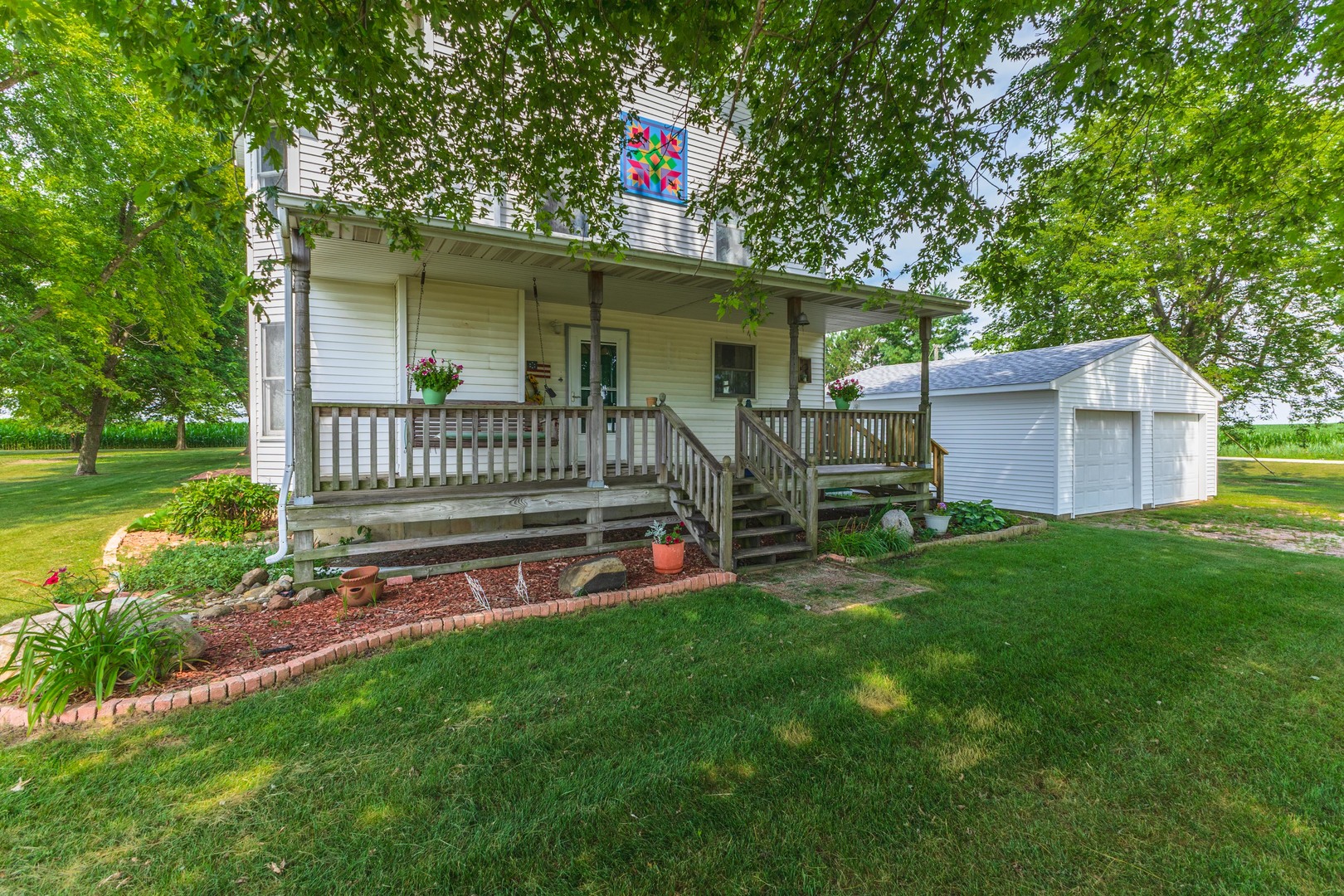 22998 East 2800 N Road Odell, IL 60460 - Photo 5 of 46 a view of a house with a yard and deck