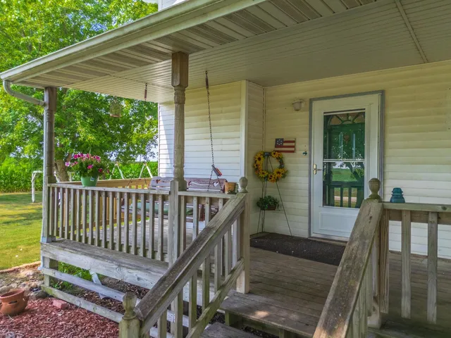 a front view of a house with a porch