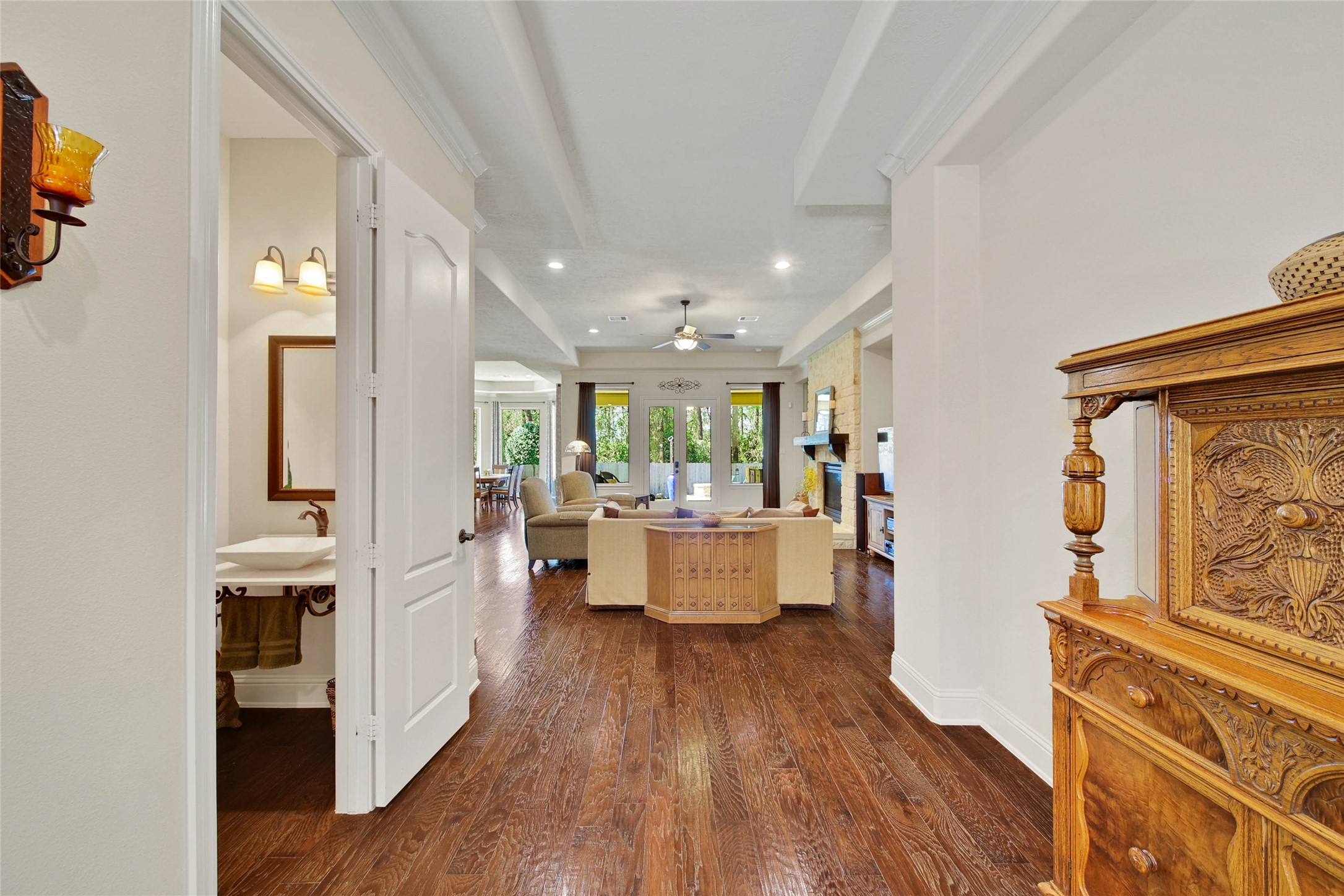 3234 Explorer Way Conroe, TX 77301 - Photo 10 of 46 Thoughtfully designed open layout showcases soaring ceilings and elegant architectural finishes.