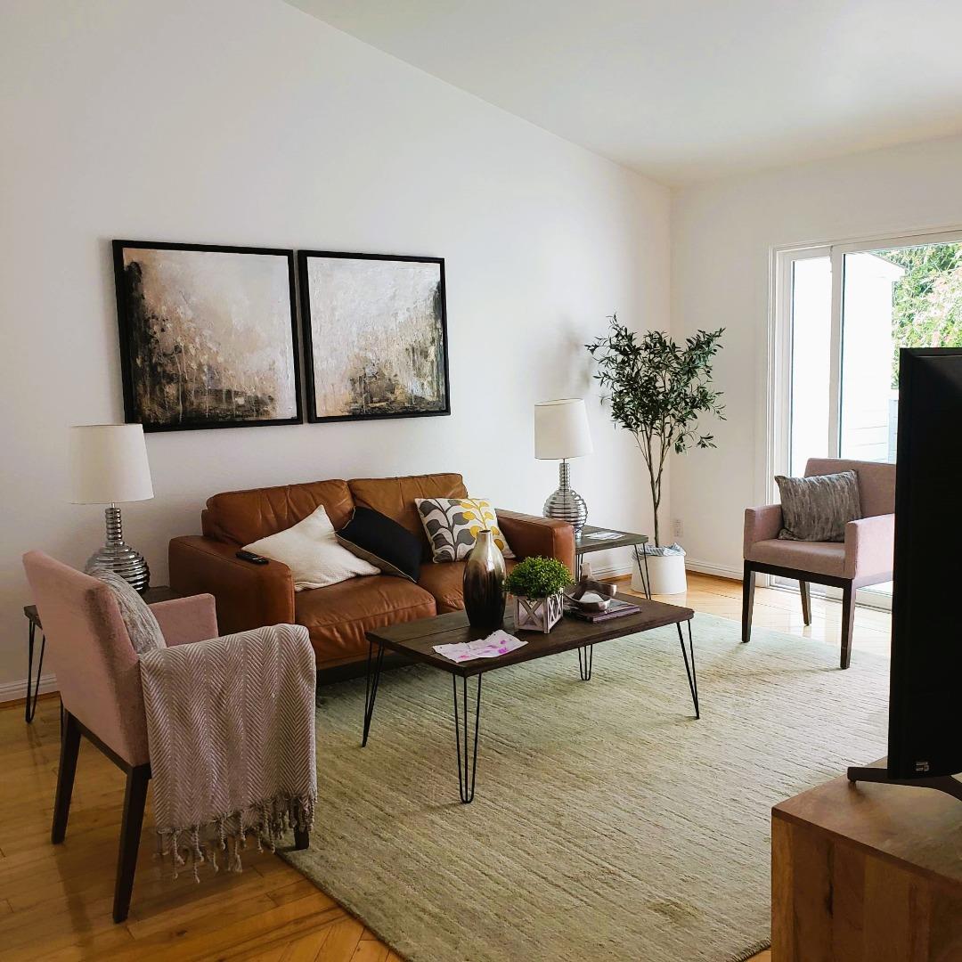 343 Shadow Run Drive San Jose, CA 95110 - Photo 4 of 17 a living room with furniture and a potted plant