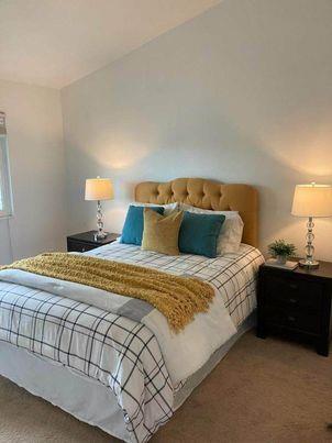 343 Shadow Run Drive San Jose, CA 95110 - Photo 5 of 17 a bedroom with a bed and a lamp