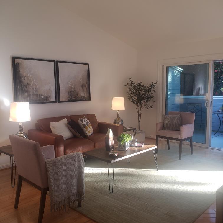 343 Shadow Run Drive San Jose, CA 95110 - Photo 6 of 17 a living room with furniture and a potted plant