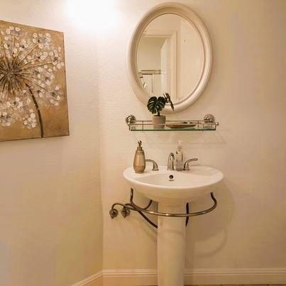 343 Shadow Run Drive San Jose, CA 95110 - Photo 7 of 17 a bathroom with a sink and mirror