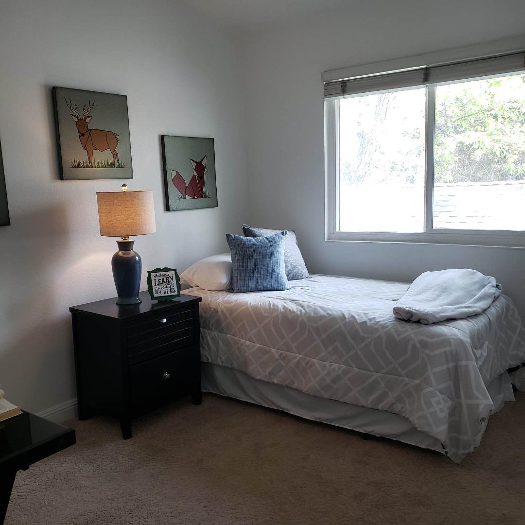 343 Shadow Run Drive San Jose, CA 95110 - Photo 8 of 17 a bedroom with a bed and a window