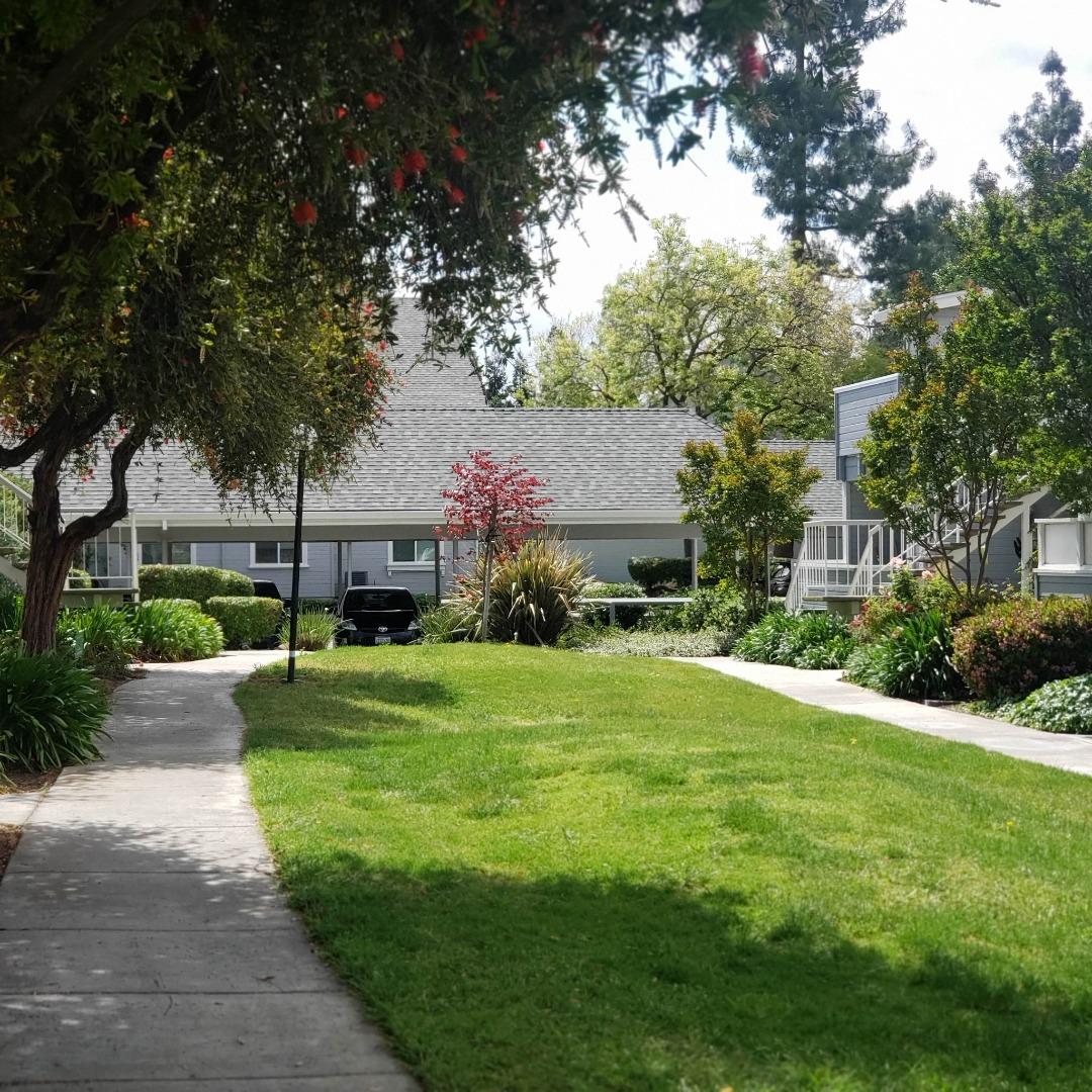 343 Shadow Run Drive San Jose, CA 95110 - Photo 10 of 17 a view of a house with garden and a bench