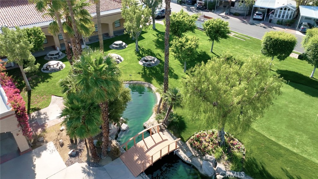 69801 Ramon Road, Unit 57 Cathedral City, CA 92234 - Photo 17 of 47 an aerial view of residential house with outdoor space and trees all around