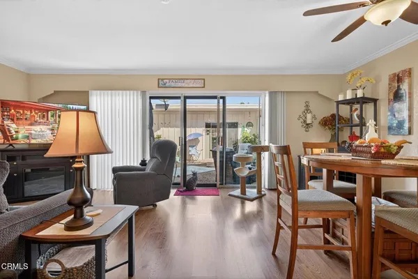 a living room with furniture and a table
