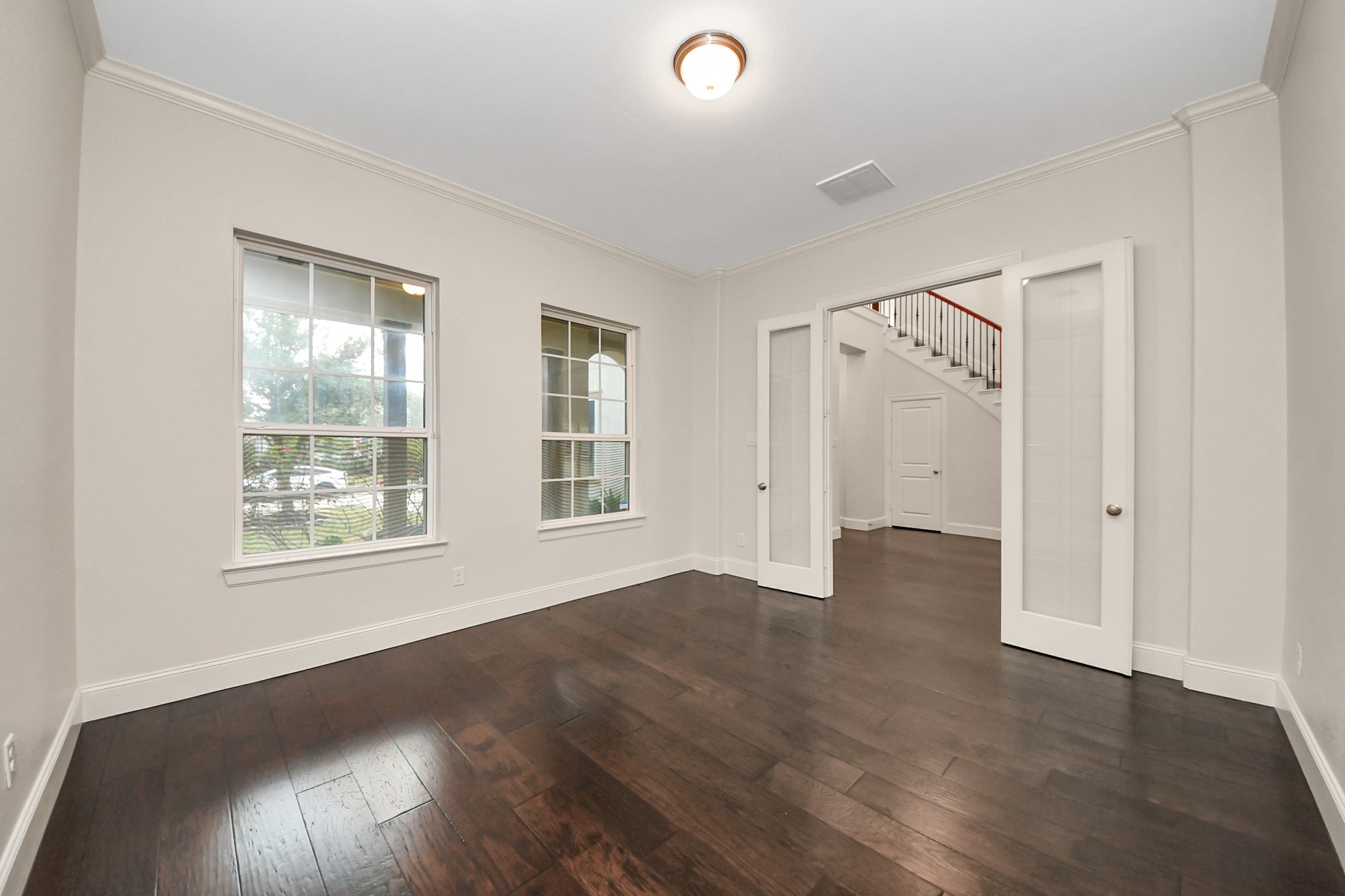 9814 Carver Drive Rosharon, TX 77583 - Photo 18 of 34 French doors lead to a bright home office.