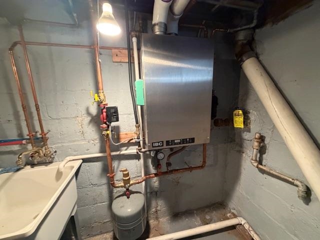 824 12th Street North Virginia, MN 55792 - Photo 32 of 34 Utilities with a sink and water heater