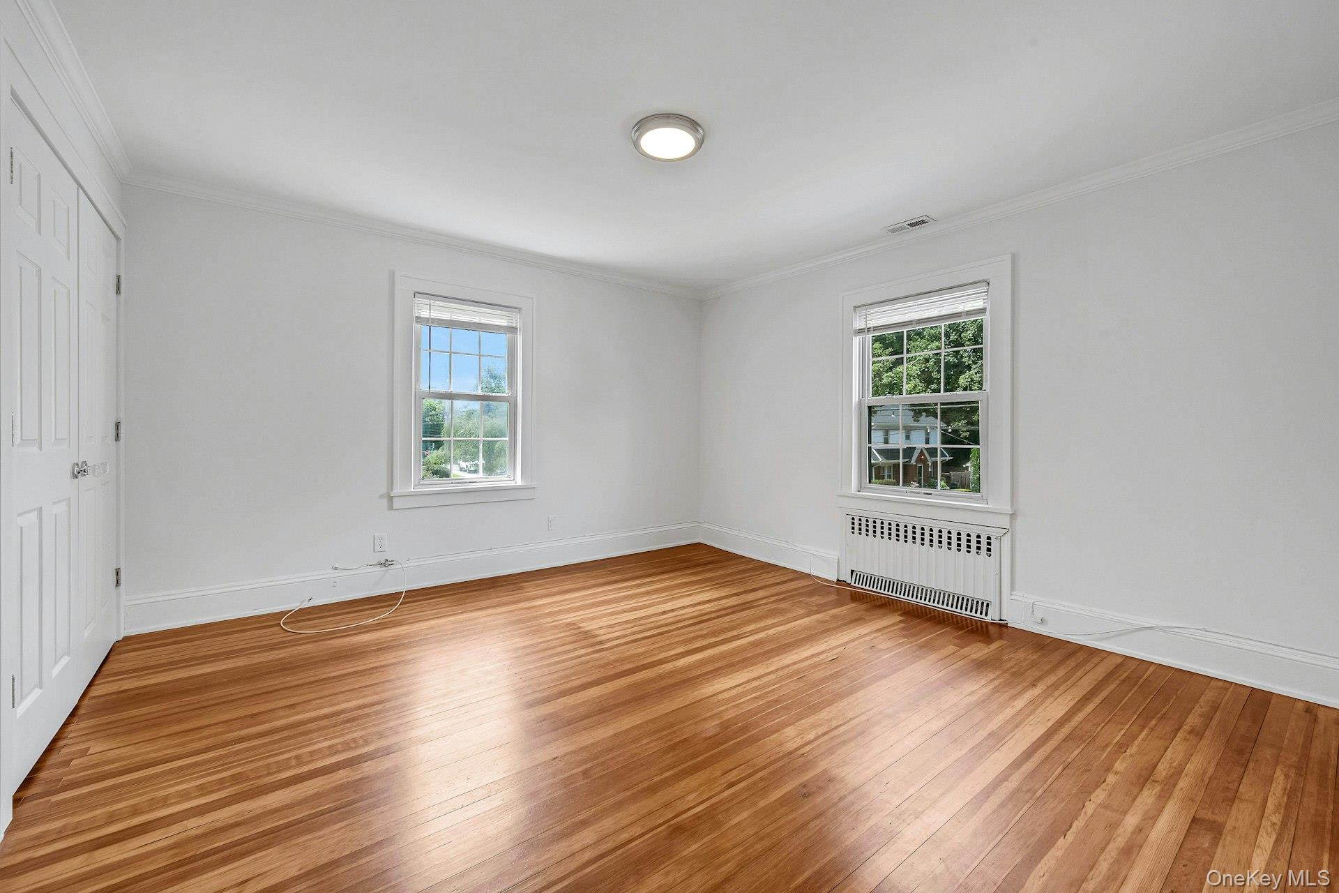 10 Carman Road Scarsdale, NY 10583 - Photo 16 of 32 Bedroom with double door closet with built-ins