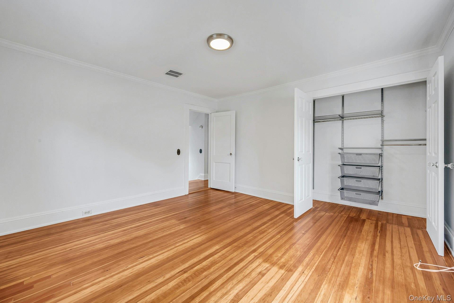 10 Carman Road Scarsdale, NY 10583 - Photo 17 of 32 Bedroom with double door closet with built-ins