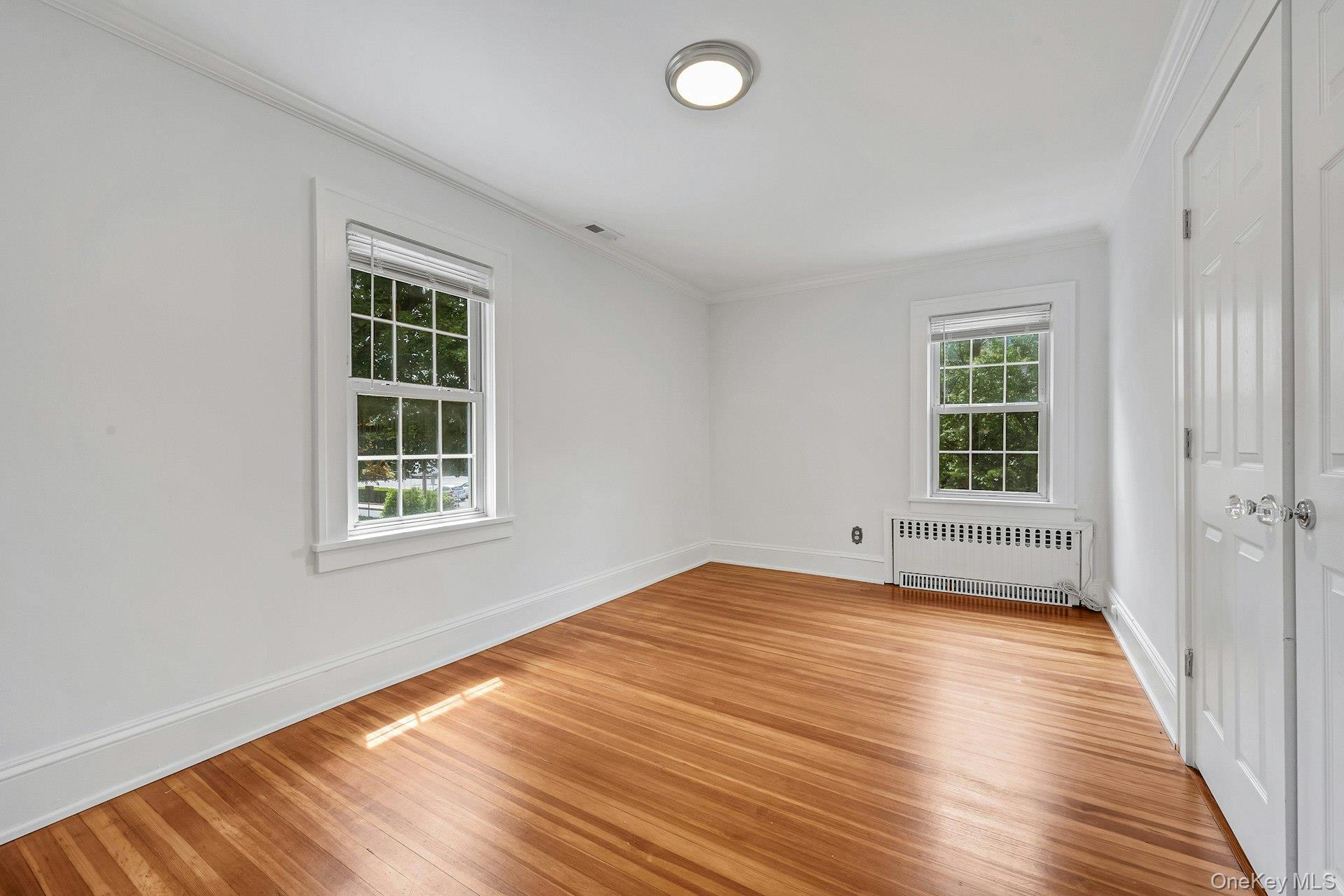10 Carman Road Scarsdale, NY 10583 - Photo 18 of 32 Bedroom with double door closet with built-ins