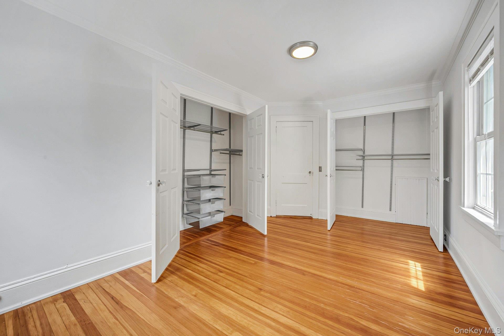 10 Carman Road Scarsdale, NY 10583 - Photo 19 of 32 Bedroom with double door closet with built-ins