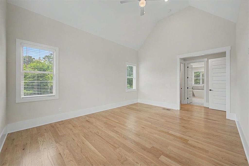 217 Laura Lake Road Marietta, GA 30066 - Photo 32 of 54 wooden floor in an empty room with a window
