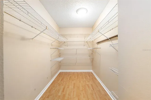 a view of a room with racks on the wall