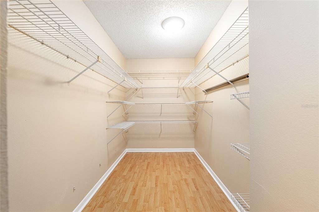 3057 Northwest 28th Circle Gainesville, FL 32605 - Photo 21 of 50 a view of a room with racks on the wall