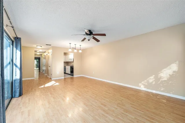 a view of a livingroom with a ceiling fan