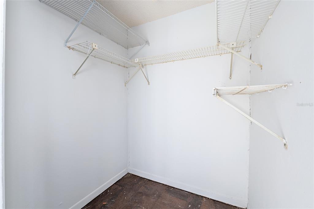 3057 Northwest 28th Circle Gainesville, FL 32605 - Photo 31 of 50 a view of small space with racks on the wall