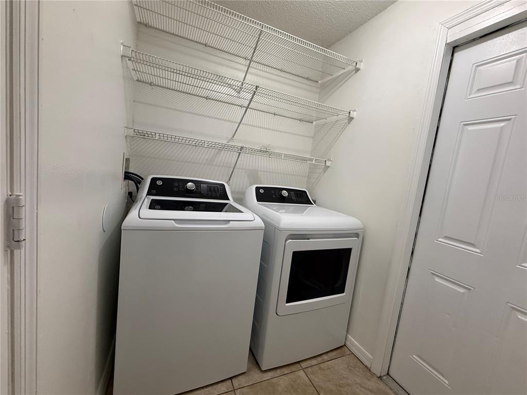10455 Fly Fishing Street Riverview, FL 33569 - Photo 22 of 25 a utility room with dryer and washer