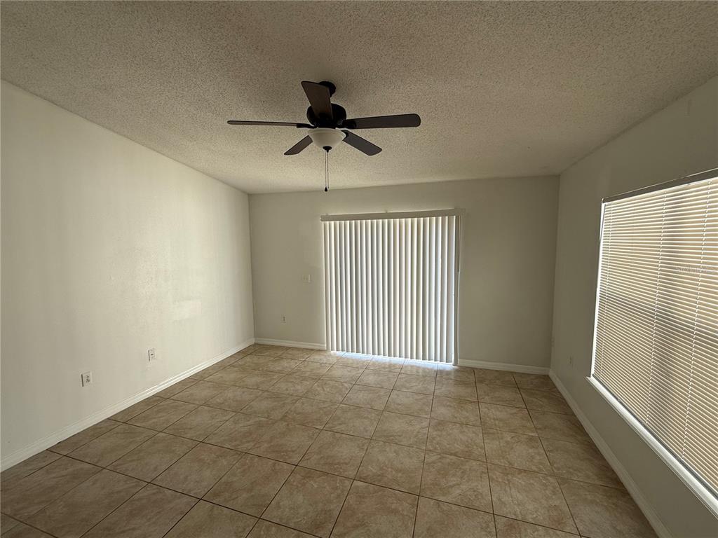 10455 Fly Fishing Street Riverview, FL 33569 - Photo 6 of 25 a view of empty room with ceiling fan