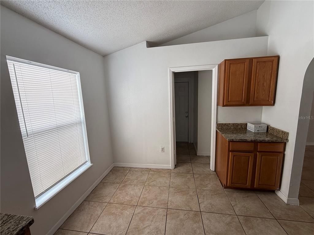 10455 Fly Fishing Street Riverview, FL 33569 - Photo 9 of 25 a room with window and cabinets