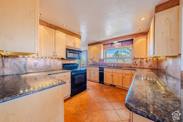 6178 East Zion Road Kanab, UT 84741 - Photo 6 of 48 Kitchen with light brown cabinets, black appliances, dark stone countertops, recessed lighting, and backsplash