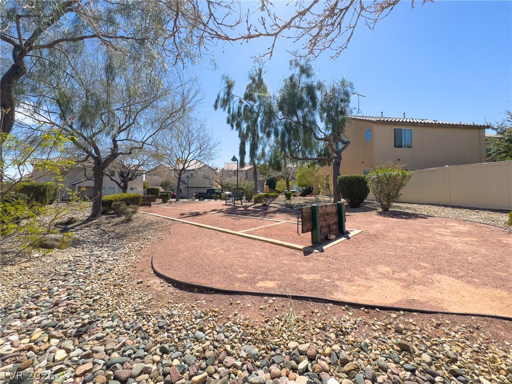 9456 Grandview Spring Avenue Las Vegas, NV 89166 - Photo 42 of 49 An inviting outdoor space offers a bocce ball court for recreational enjoyment.