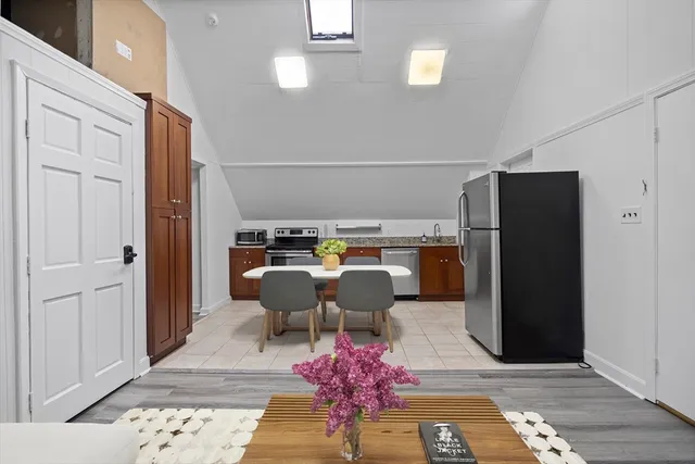 a living room with furniture and a rug