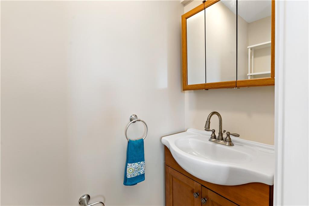 357 Gregg Street Carnegie, PA 15106 - Photo 11 of 34 a bathroom with a sink and a mirror