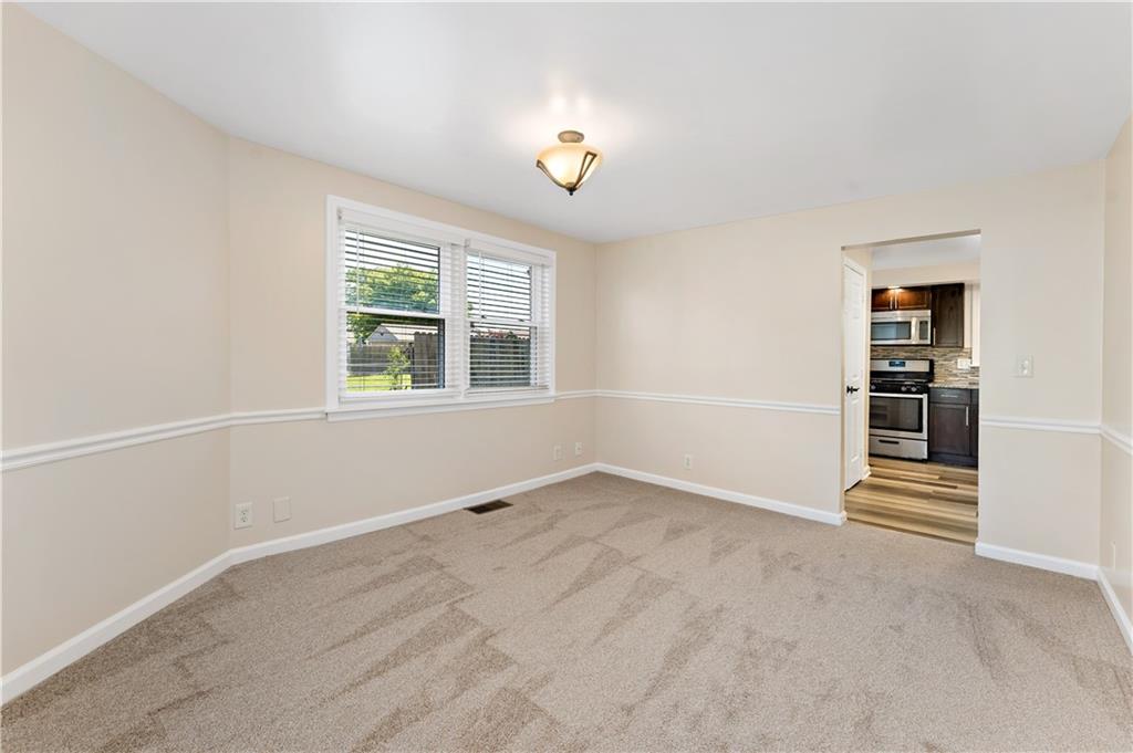 357 Gregg Street Carnegie, PA 15106 - Photo 6 of 34 an empty room with windows and closet