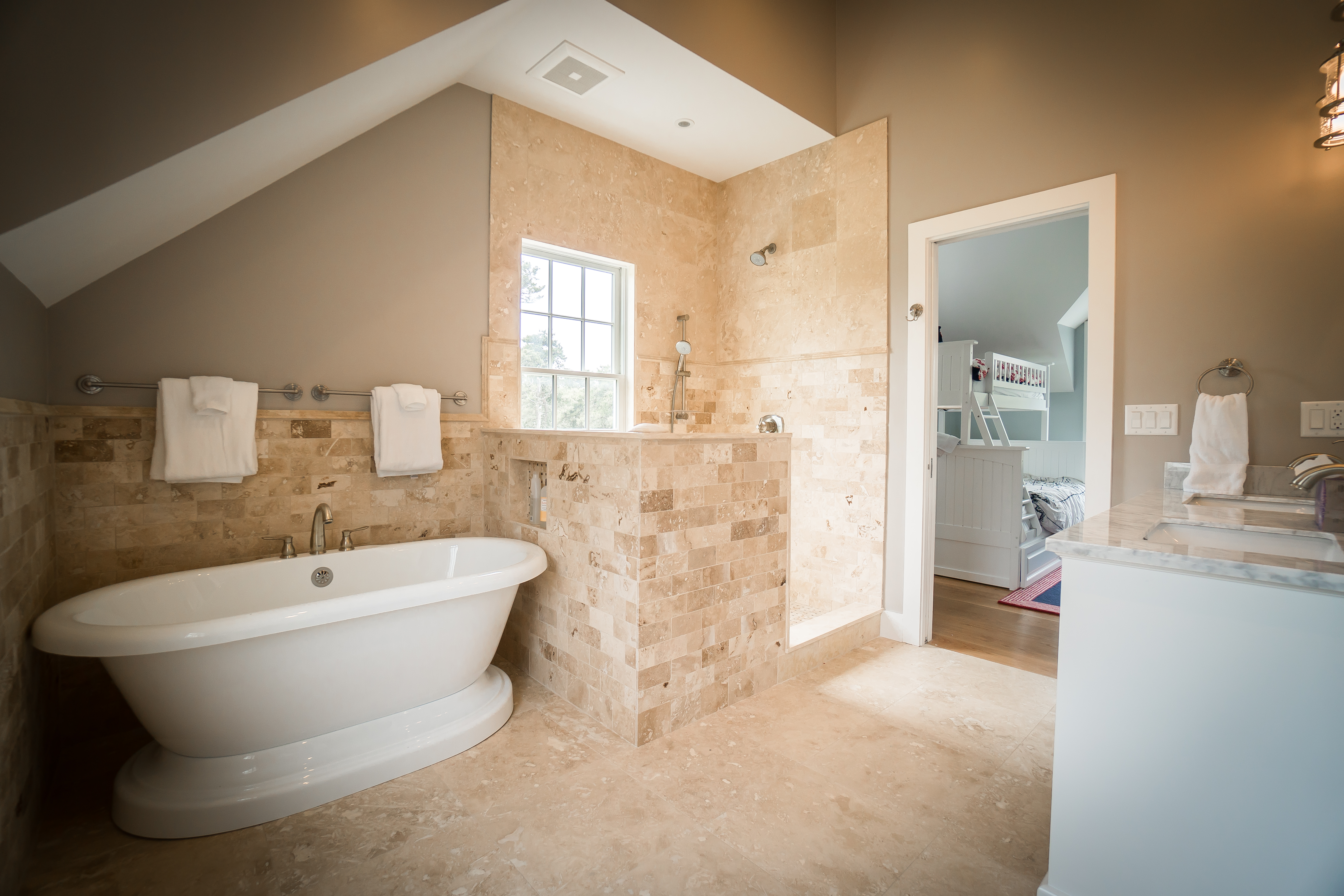 50 Lovers Lane Nantucket, MA 02554 - Photo 23 of 34 a spacious bathroom with a bathtub and sink