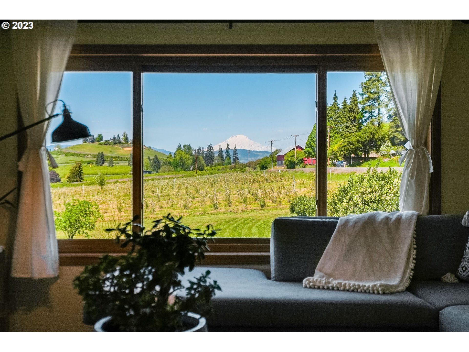 2766 Eastside Road Hood River, OR 97031 - Photo 12 of 30 a view of a room with furniture and a large window