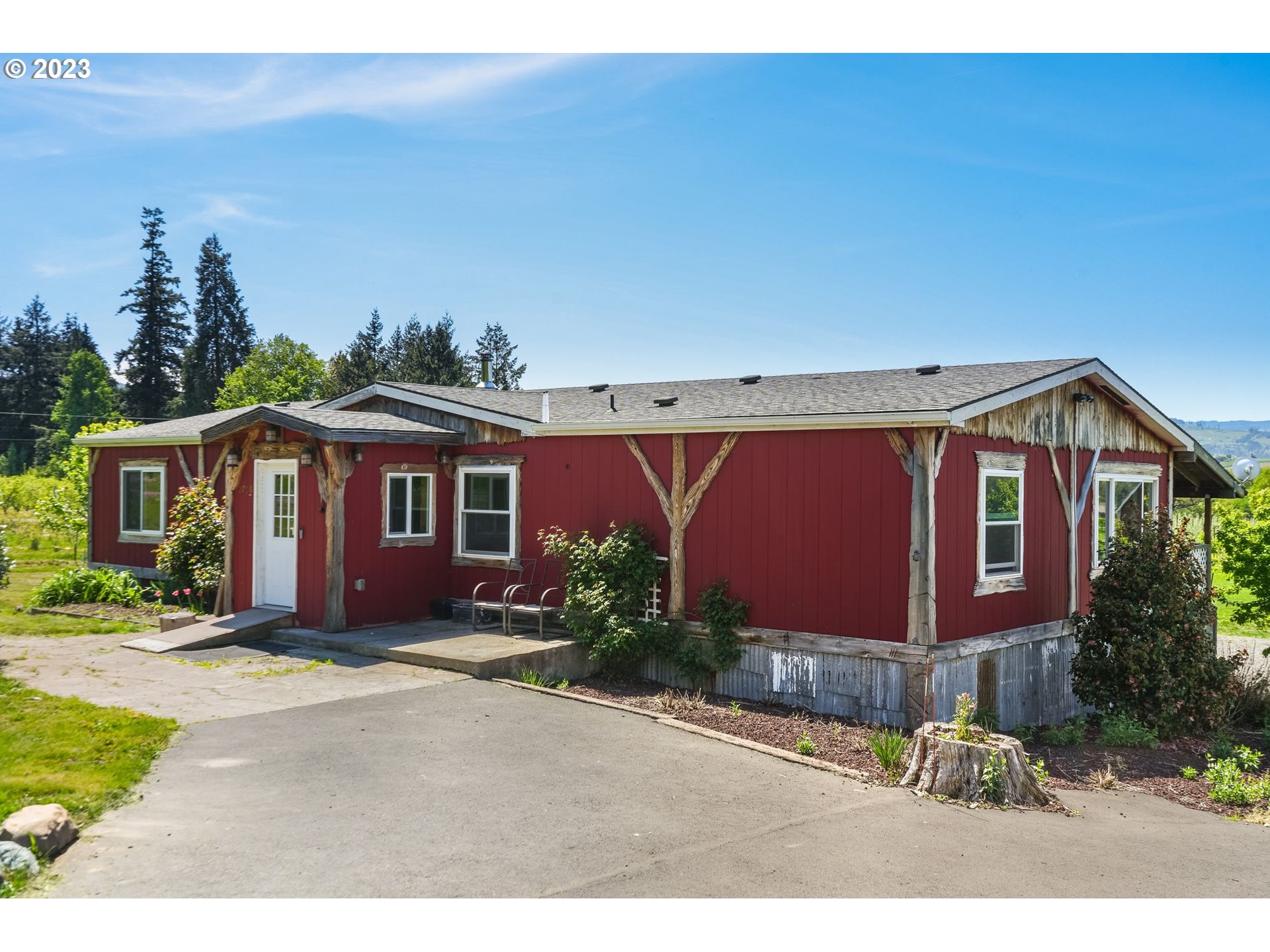 2766 Eastside Road Hood River, OR 97031 - Photo 3 of 30 a front view of a house with a yard