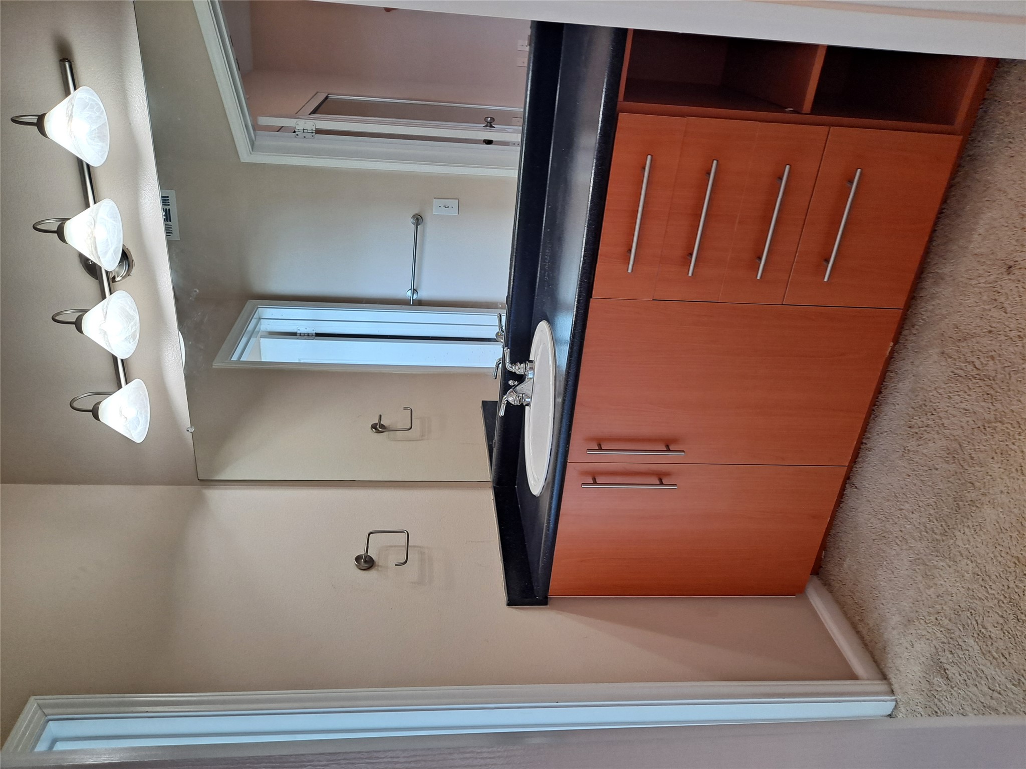 11203 Ranch Road 2222, Unit 2404 Austin, TX 78730 - Photo 13 of 28 Bathroom with vanity and light colored carpet