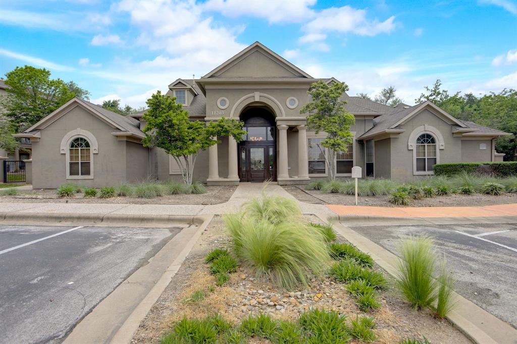 11203 Ranch Road 2222, Unit 2404 Austin, TX 78730 - Photo 19 of 28 View of property featuring uncovered parking